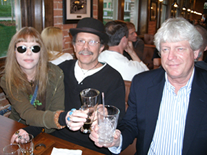 Lady Passion and *Diuvei raise a toast with Stewart B. Coleman on opening day of Pack's Tavern, April 19, 2010