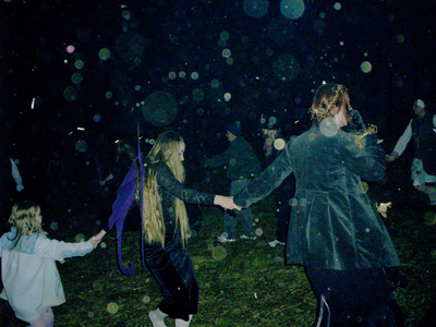 Ecstatic spiral dance at Samhain 2007 with many orbs